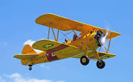 Antiqur biplane flying over the Delaware Valley from Van Sant Air Field